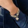 Armband med dubbla kedjor och hjärtlås