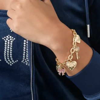 Armband med hjärt- och nyckelberlock