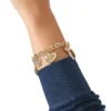 Armband med hjärt- och nyckelberlock