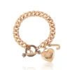 Armband med hjärtberlock