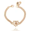 Armband med hjärtcharm och krona