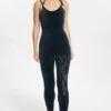 Jumpsuit i velour med remmar och text