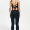 Jumpsuit i velour med remmar och text