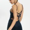 Jumpsuit i velour med remmar och text