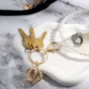 Kroncharm med strass, nyckelring och väskcharm