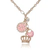 Lager-på-lager-halsband med rosa emaljdetaljer