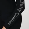 Liten blingad kort stickad jacka