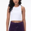 Liten glittrig, sömlös crop-top med hög hals