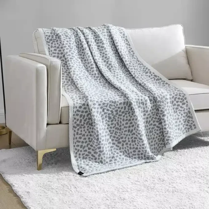 Pläd med leopardmönster
