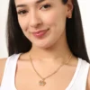 Set med halsband och örhängen med rosa kristallkrona