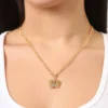 Set med halsband och örhängen med rosa kristallkrona