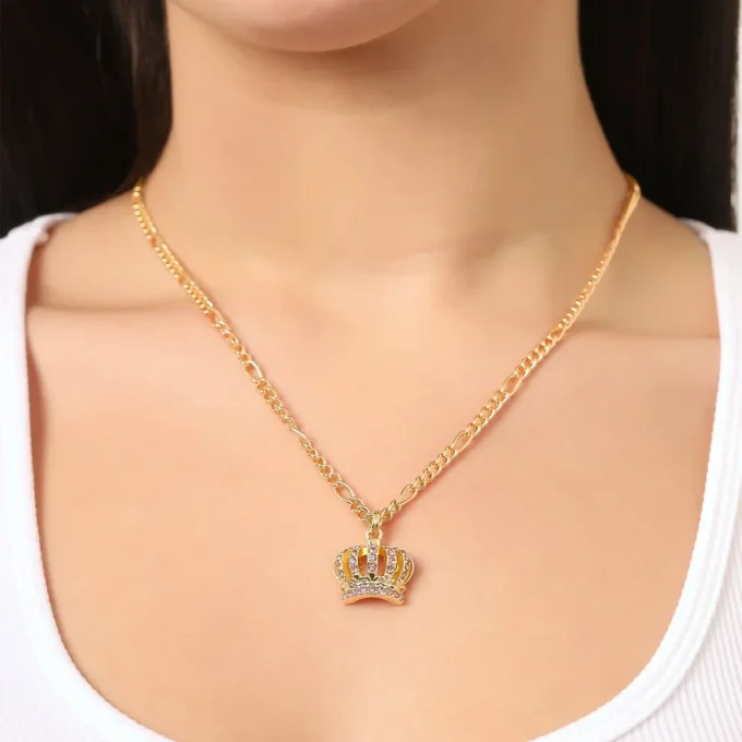 Set med halsband och örhängen med rosa kristallkrona