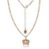Set med halsband och örhängen med rosa kristallkrona